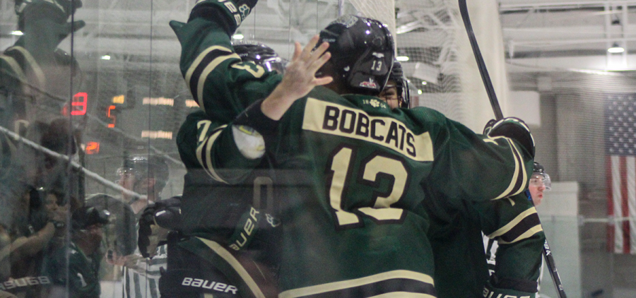 Ohio Hockey players celebrating one of nine goals in night two against Oswego State.