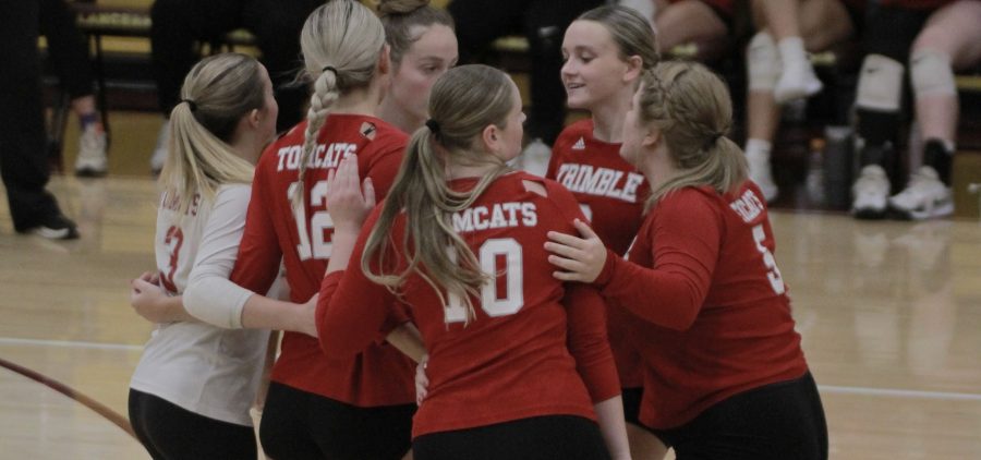 Trimble comes together to celebrate a point
