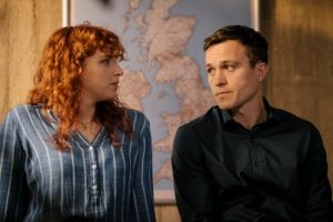 Dan Winters and Chloe Highsmith Looks at each other. A map is displayed behind them.