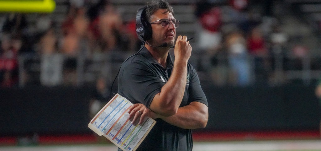 Ohio Football head coach Brian Smith standing on the sideline during the team's game vs Rutgers.