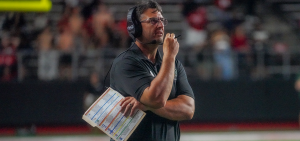 Ohio Football head coach Brian Smith standing on the sideline during the team's game vs Rutgers.