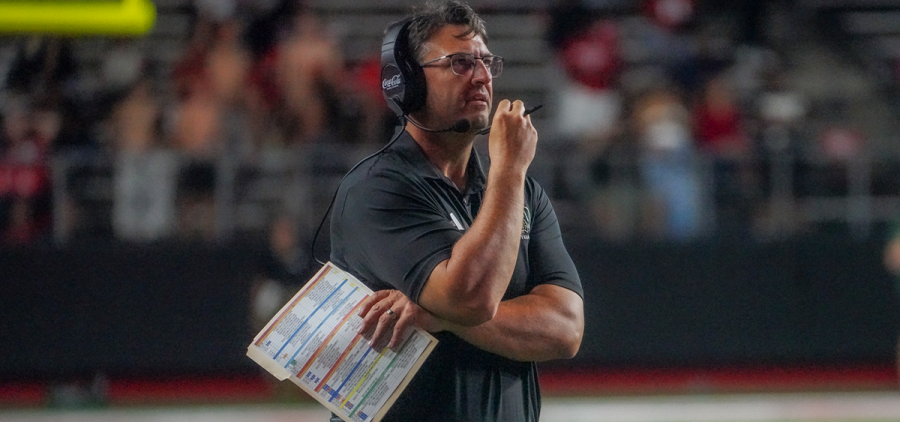Ohio Football head coach Brian Smith standing on the sideline during the team's game vs Rutgers.