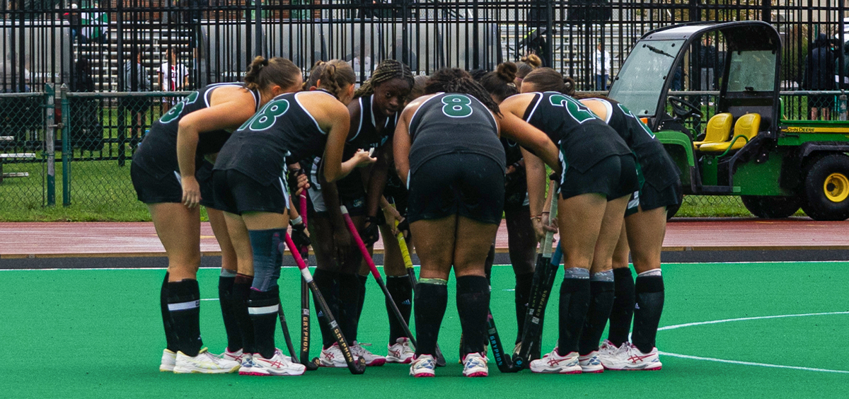 The Ohio Field Hockey team huddling before a corner against Longwood.