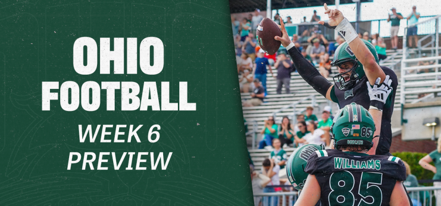 Parker Navarro being lifted up after scoring a rushing TD against Bowling Green.