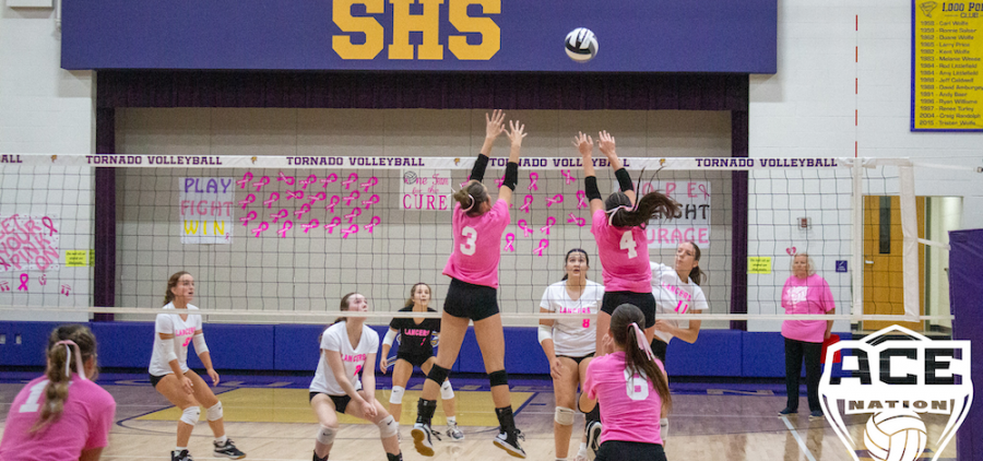 Tornado Jaylynn Hupp blocks at the net