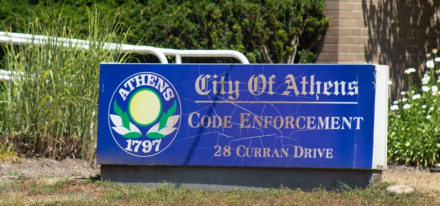 Sign outside city of Athens code enforcement office.