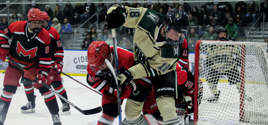 Ohio Hockey forward Lance Mengel making a play near the Maryville net.