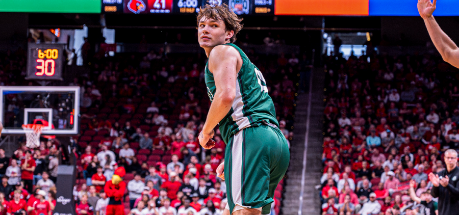 Ohio Men's Basketball guard Ajay Sheldon looking back to the Louisville after making a three.