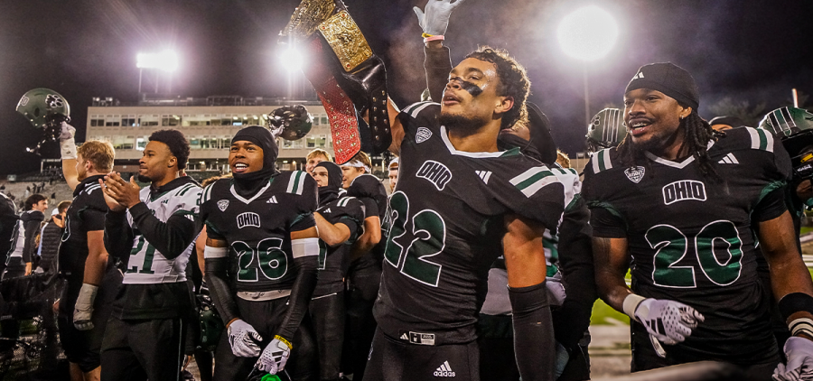 Ohio DB Jalen Thomeson celebrating with the turnover belt after his game-sealing interception vs Miami.