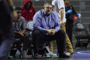Ohio Wrestling head coach Joel Greenlee on the bench during the team's matchup with Morgan State. 