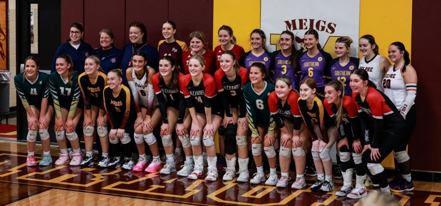 Participants of the showcase pose for a post game photo