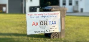 A sign promoting the petition effort to get an amendment to abolish property taxes before voters, on a yard in Fairfield County in central Ohio.