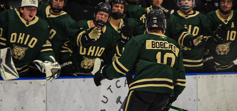 Ohio Hockey forward Drake Albers skating by the bench after one of his two goals vs Niagara.