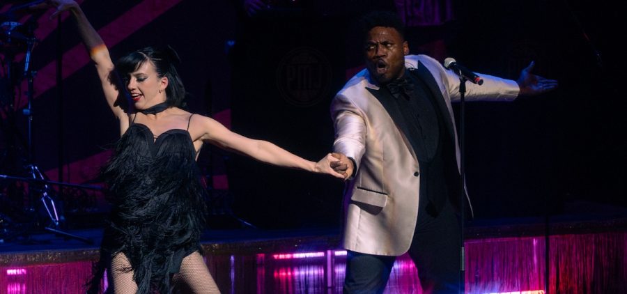 Rogelio Douglas, Jr. (Right) performs an afro-cuban take of "Hotel California." With Demi Remick (Left) they blend dance and musicianship at The Southern Theater. Columbus, OH 11.19.25 (Henry Day | WOUB)