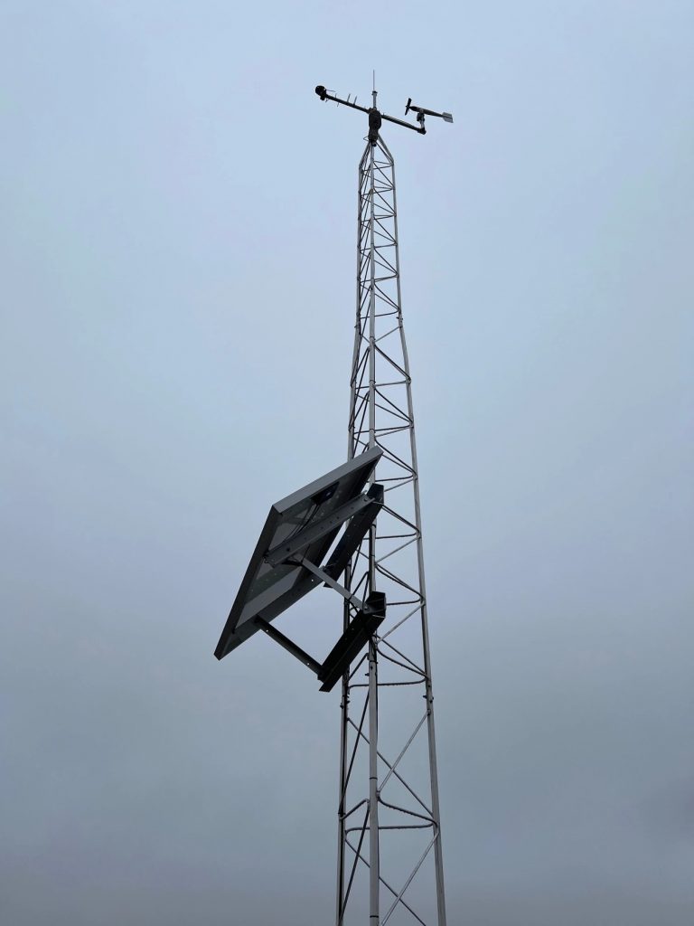 A mesonet station looks like a tower with weather monitoring instruments on it.