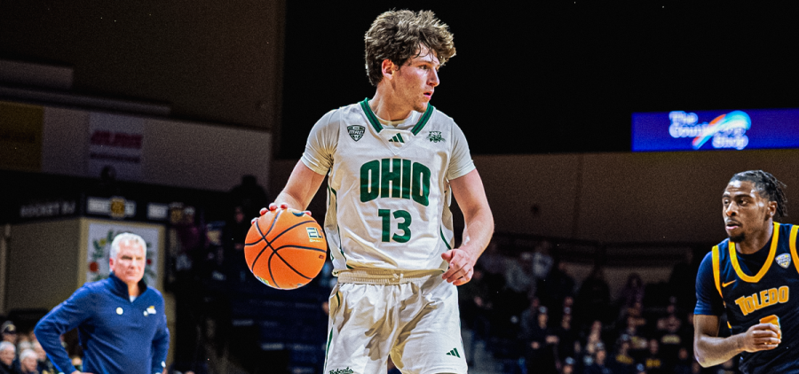 Ohio Men's Basketball guard Jackson Paveletzke dribbling in the team's game at Toledo.