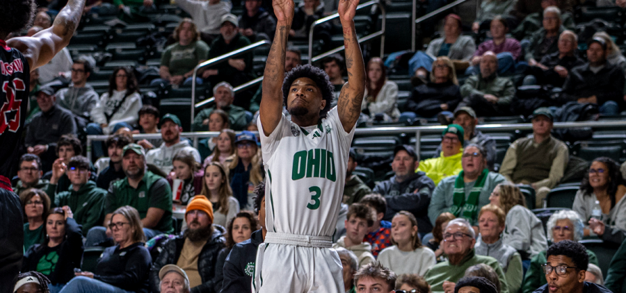 Ohio Men's Basketball guard Dior Conners taking a corner three against NIU.