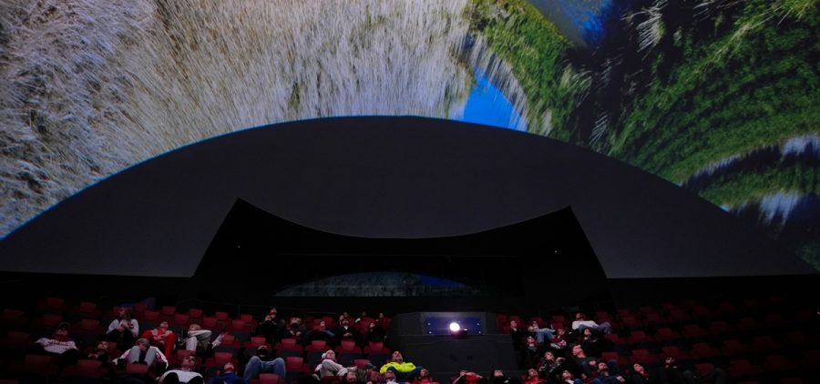 Audience members watch "Ohio: Wild at Heart" that features the state's top-rated park system to highlight wildlife conservation efforts and the restorative power of outdoor recreation at the Robert D. Lindner Family OMNIMAX Theater