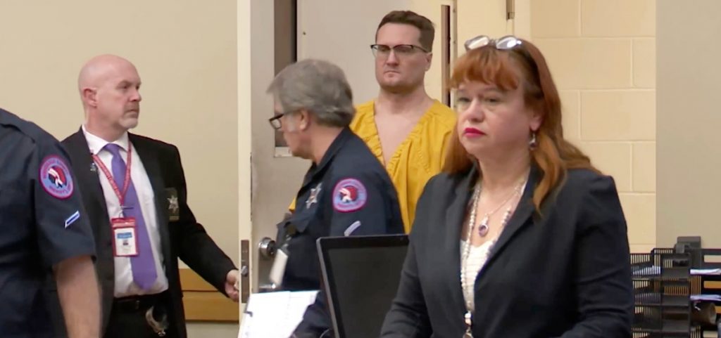 This image taken from video shows Michael David McKee walking into the courtroom