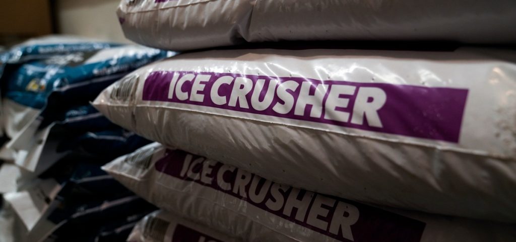 Ice Crusher, a calcium chloride blend road salt, is displayed for sal