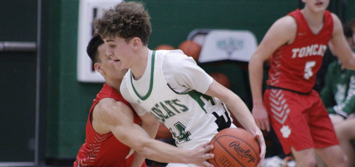 Reese Lang tried to control the ball against the Trimble Tomcat defender.