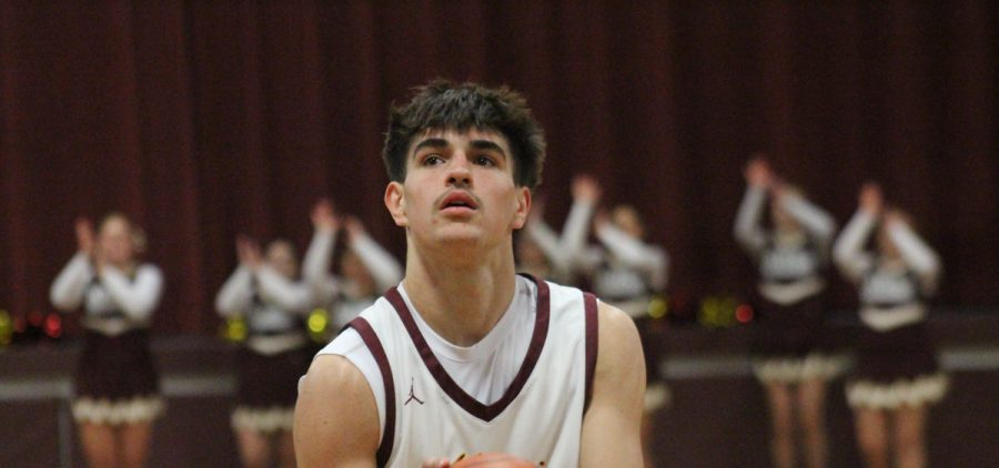 Colben Beucler setting up for free throws.