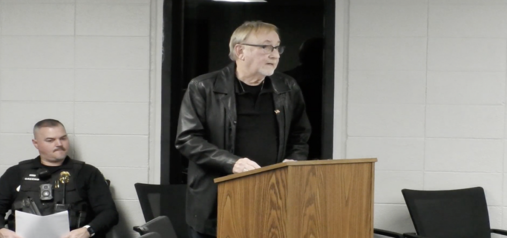 Jonathan Flowers read a letter at Monday night's council meeting.