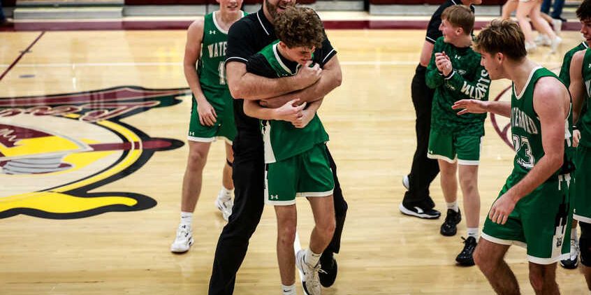 Reese Lang celebrating after making half-court shot to beat Federal Hocking in overtime. [Logan Smutylo | WOUB Hardwood Heroes]