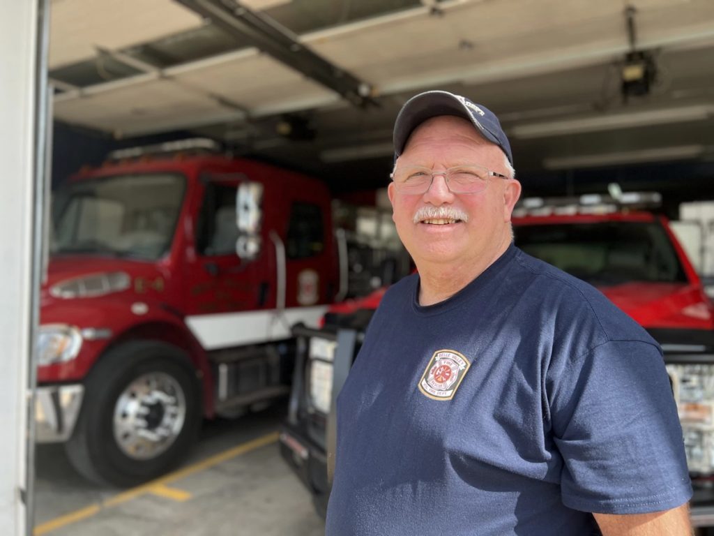 Ed McKee poses in front of the Belle Valley Volunteer Fire Department.