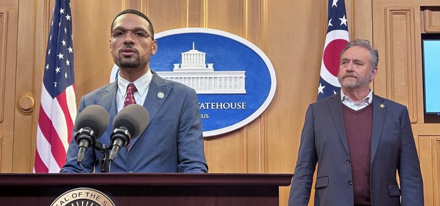 Rep. Josh Williams speaks to reporters about his child care fraud bill, with Republican Attorney General Dave Yost, who supports the bill, alongside him