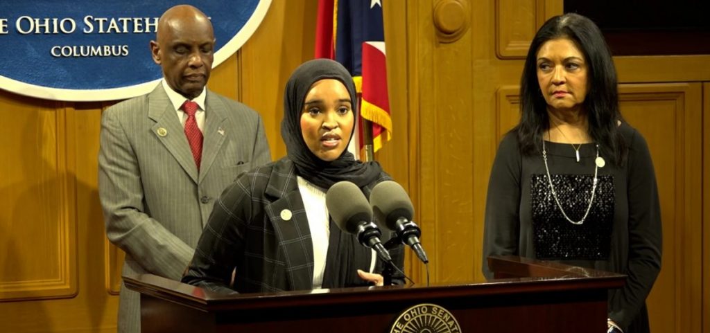 Rep. Munira Abdullahi (D-Columbus) speaks at a press conference on President Trump's executive orders on immigration in February 2025, along with Reps. Cecil Thomas (D-Cincinnati) and Anita Somani (D-Dublin).
