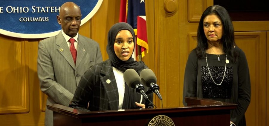 Rep. Munira Abdullahi (D-Columbus) speaks at a press conference on President Trump's executive orders on immigration in February 2025, along with Reps. Cecil Thomas (D-Cincinnati) and Anita Somani (D-Dublin).