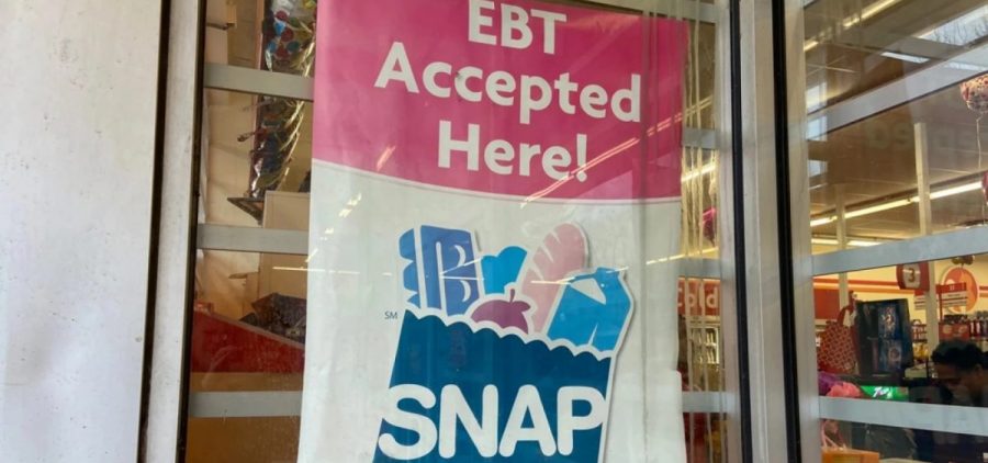 A sign shows electronic benefit transfer (EBT) cards used for SNAP benefits is accepted at a store in Columbus.