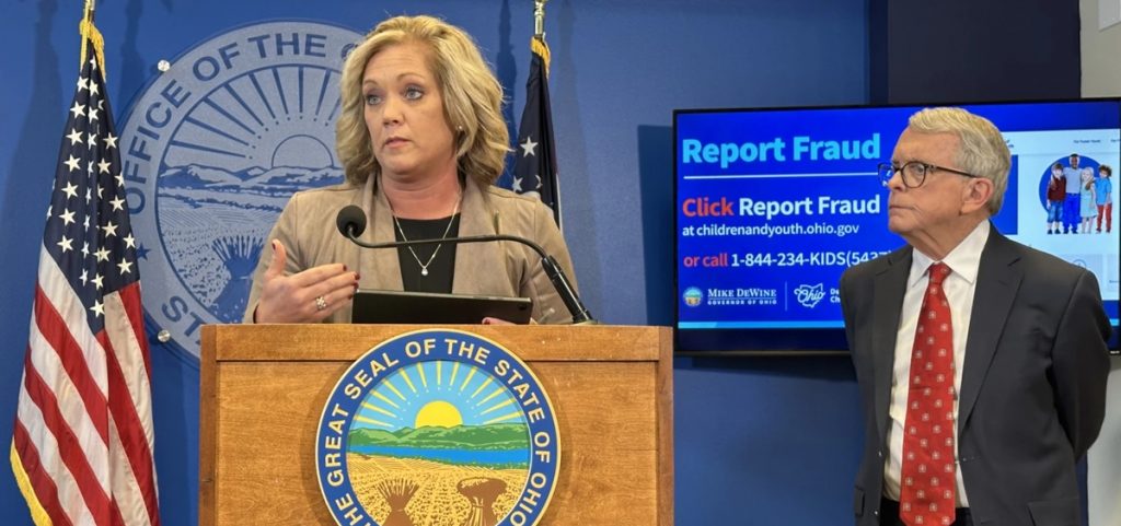 Ohio Department of Children and Youth Director Kara Wente (left) with Gov. Mike DeWine (right) in a press conference.