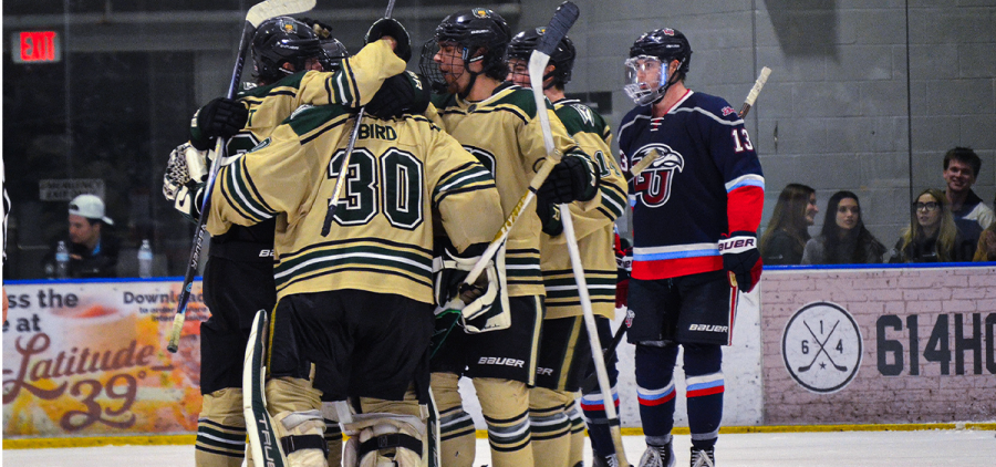 The Ohio Hockey team celebrating their win over Liberty on Friday night at Bird Arena.