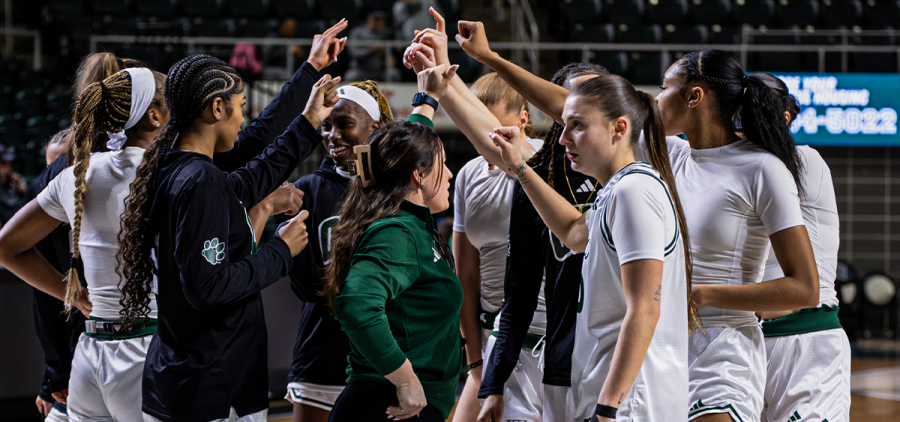 The Ohio Women's Basketball team breaking from a huddle during the game against Bowling Green.