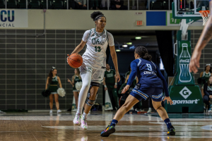 Ohio Women's Basketball guard Monica Williams brining the ball up the court in the game vs ODU. 