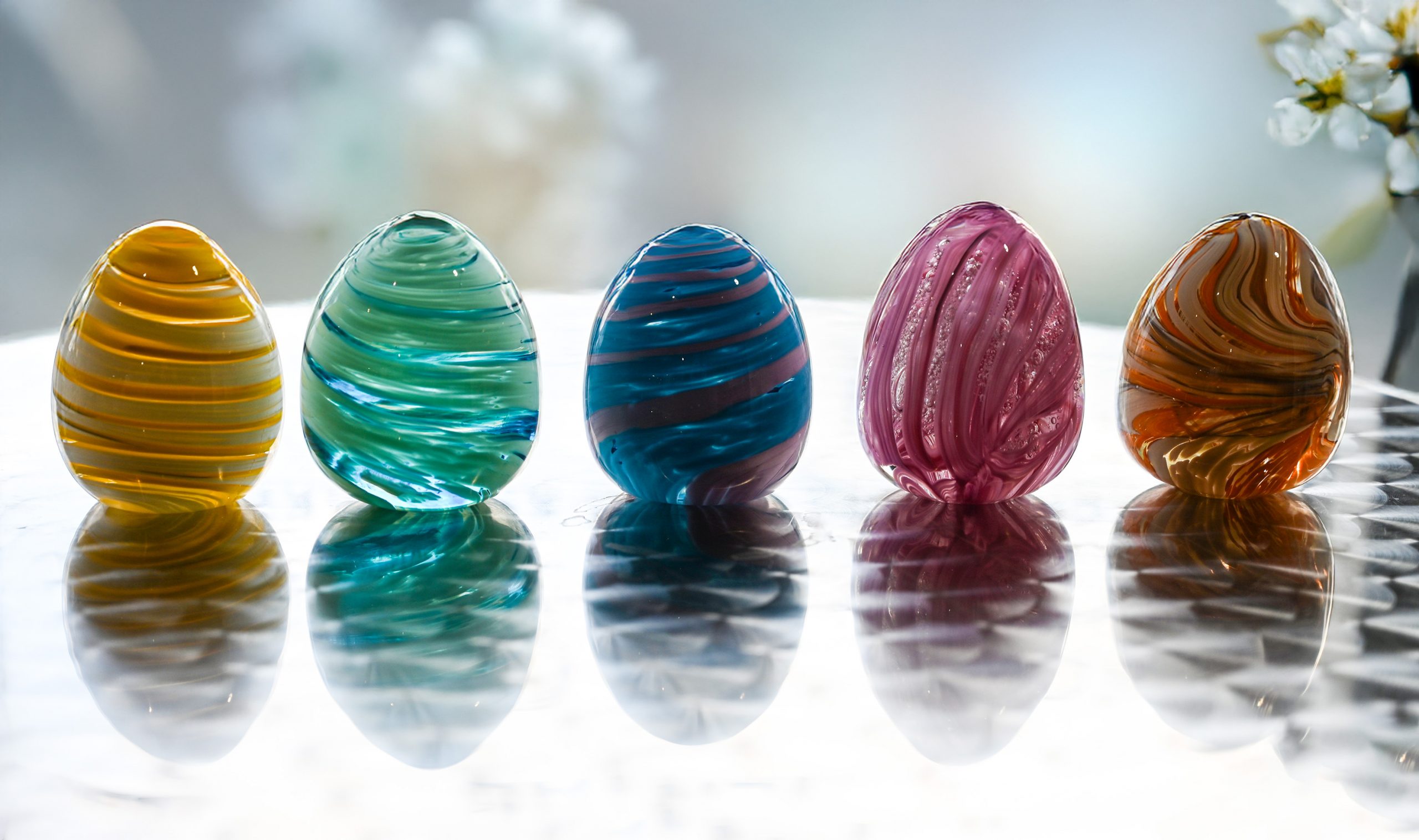 An image of Easter egg shaped paperweights.