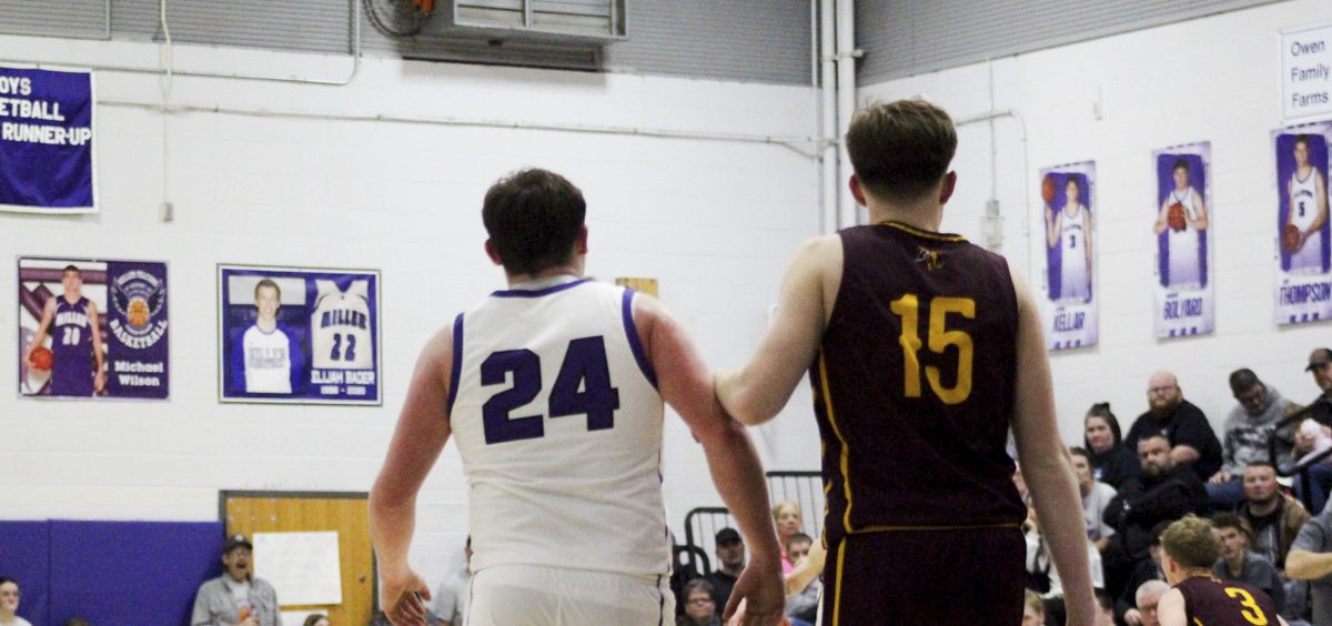 The Federal Hocking defender prepares to guard the Miller Falcons' player.