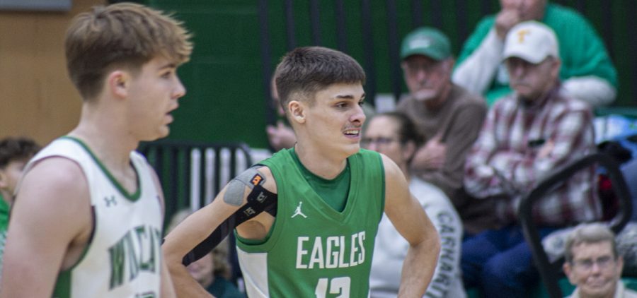 Eastern and Waterford players standing next to each other waiting for the ball to get inbounded.