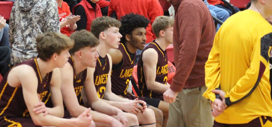 The Lancers' bench looks on at the game against Fairfield.