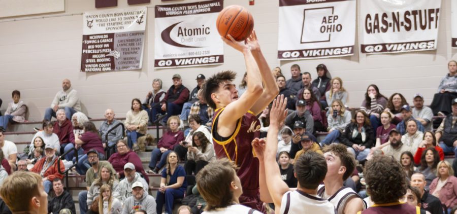 Meigs player goes up over the Vinton County team for a tough basket in the paint.