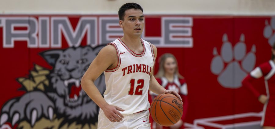 Brady Jajczyk dribbles the ball up the court against Belpre.