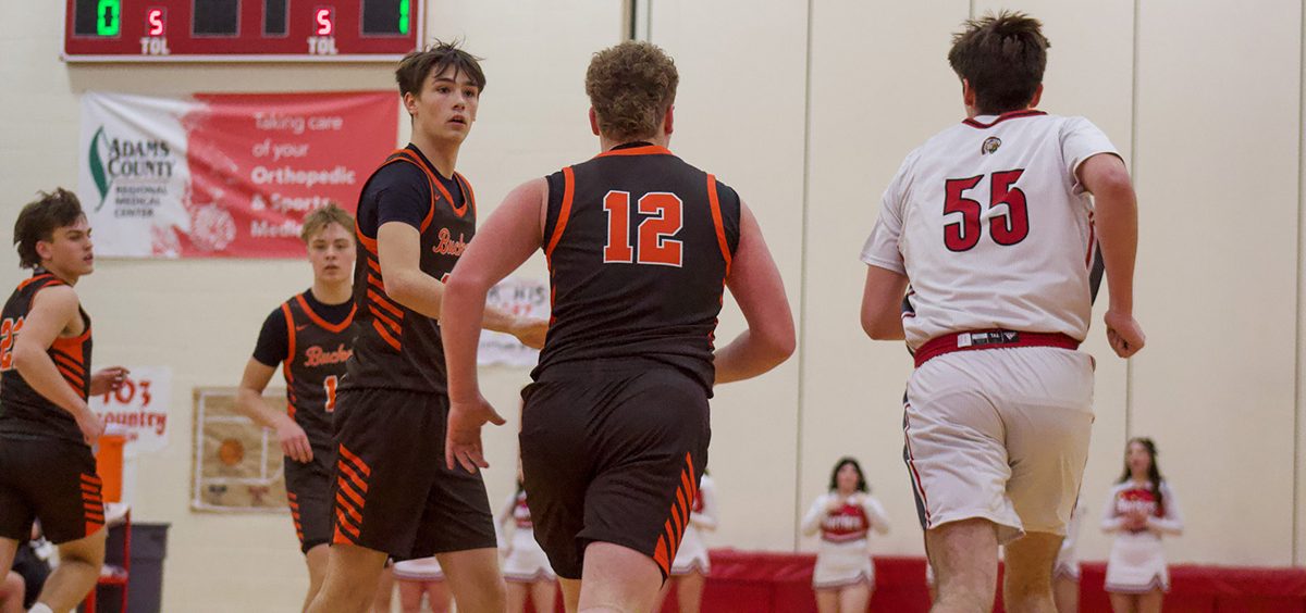 Cam Sullivan runs down the court to get back on defense, after the offensive possession.