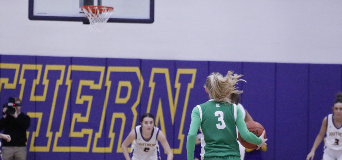 Kyrstin Fackler takes the ball up the court against Southern.