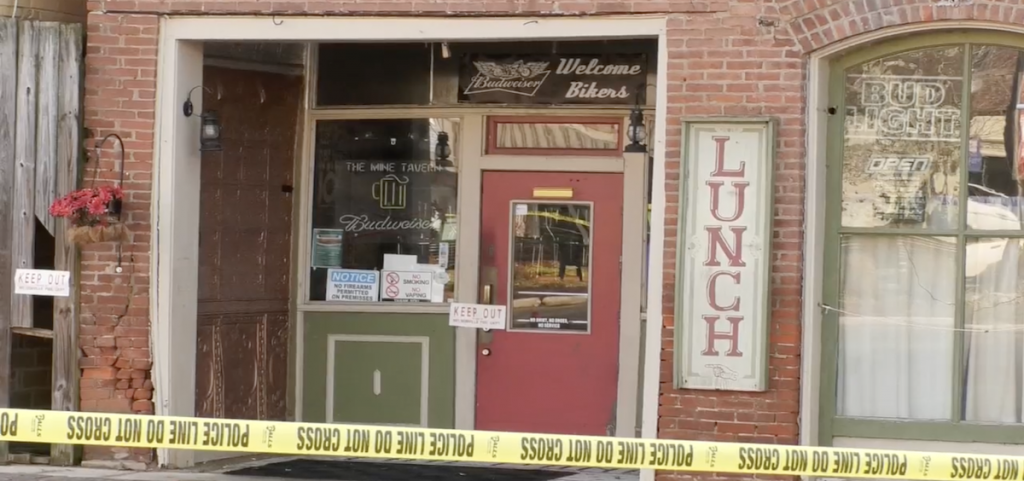 The Mine Tavern is blocked by police tape after a partial wall collapse.
