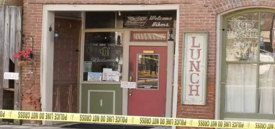 The Mine Tavern is blocked by police tape after a partial wall collapse.