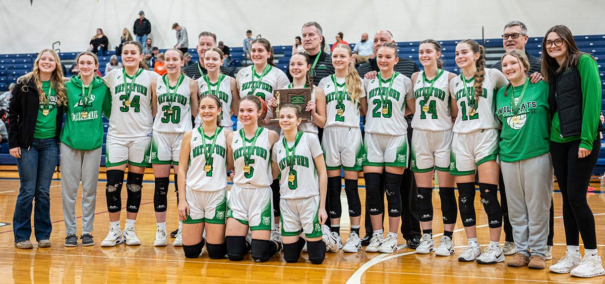 The Waterford Lady Wildcats pose for a picture after winning their third straight District Championship.