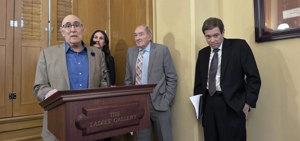 Former Ohio Supreme Court Chief Justice Eric Brown, Dayton City School Board member Jocelyn Rhynard, school funding advocate Bill Phillis and attorney Mark Wallach at a press conference.