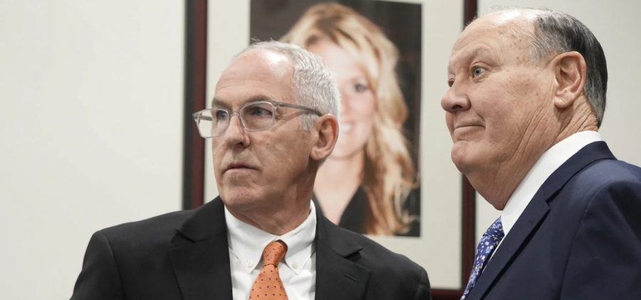 Defendants Michael Dowling and Chuck Jones wait for the start of their trial in Summit County Court of Common Pleas Judge Susan Baker Ross's courtroom.